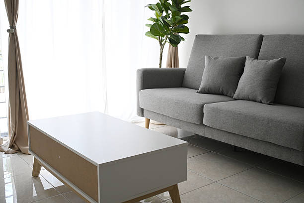 istock New home, new design, warm home. Sofa, coffee table. 2220581375