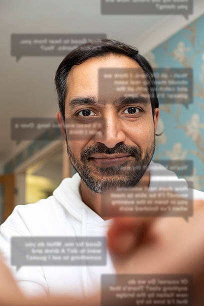 istock Smartphone POV of a man scrolling through mobile phone messages 2220582025