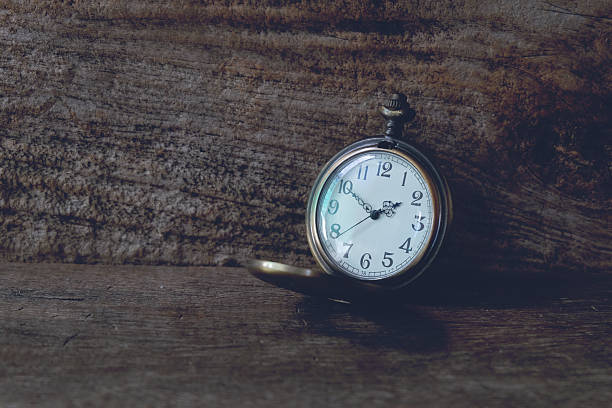 istock Vintage Locket Watch on wood Background. 2220584311