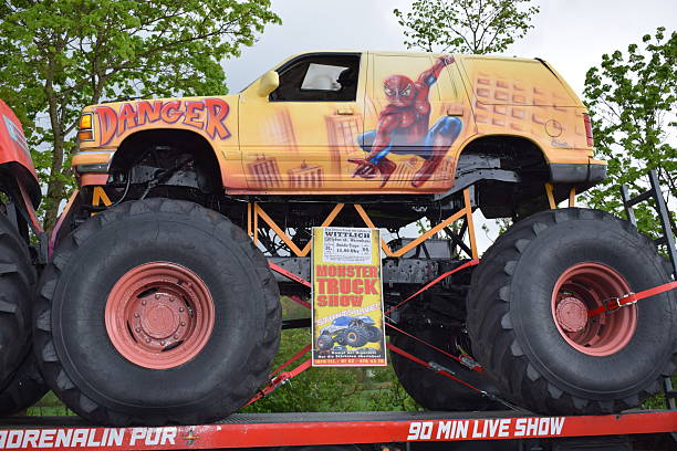 Eifel, Germany - 04/24/2025: orange monster truck