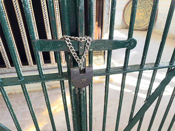 Old Barred Door and Padlock, Protection and Security Concept (Depth Of Field)