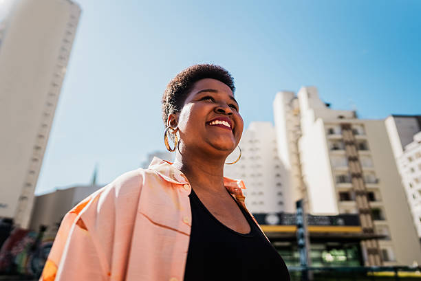 istock Young woman comtemplating on the city 2220591795