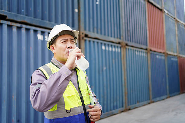 istock The image represents rest during labor, hydration, and the industrial logistics environment. 2220591799