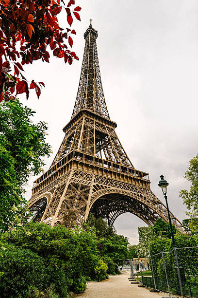 istock The Eiffel Tower Surrounded by Lush Greenery and Vibrant Autumn Foliage in Paris 2220591805
