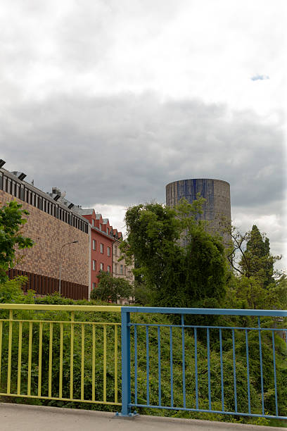 istock Urban Landscape Featuring a Tower Surrounded by Lush Greenery and Nature 2220592358