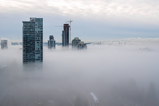 istock City in the fog 2220593484