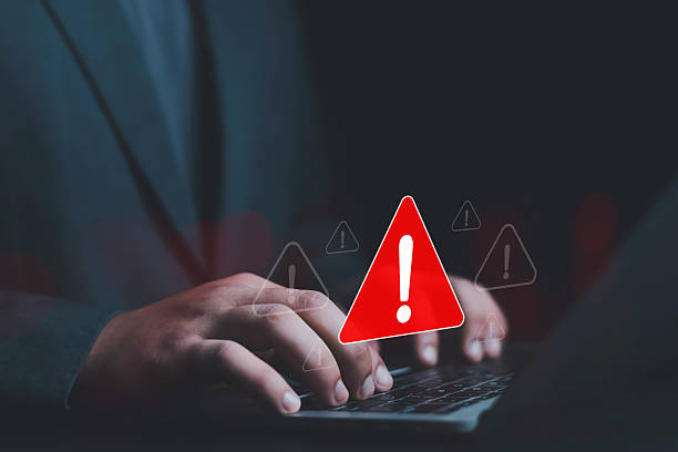 istock System hacked warning alert on laptop. error 404 alerts on a laptop, caution of spam in website digital Cyber attack on computer network, Virus, Spyware, Malware or Malicious software. Cyber security 2220597233