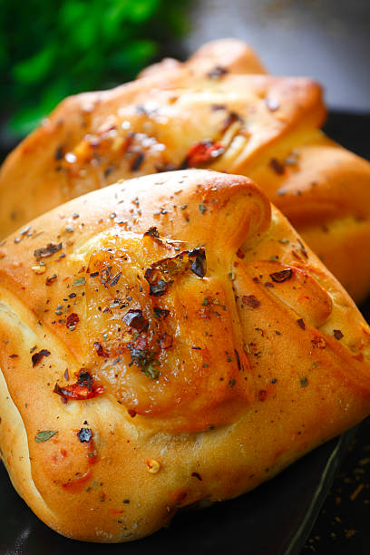 istock Cheesy Pizza Bun with Toppings 2220597308