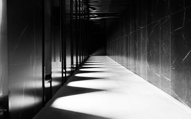 istock Dark and mystery corridor in building 2220598027