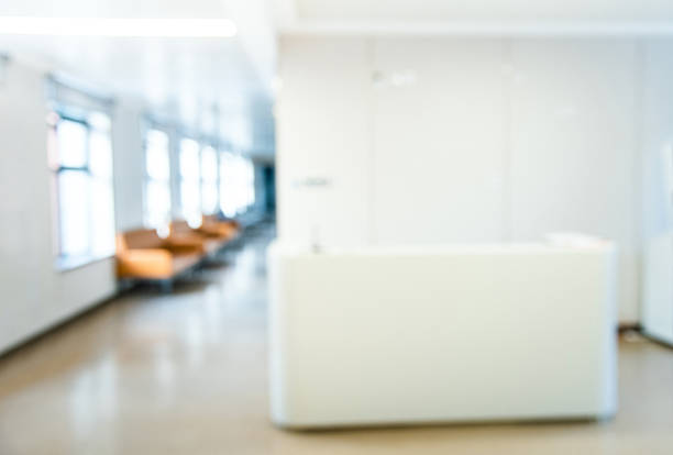istock Defocused of orange sofas in the hospital hallway 2220598662