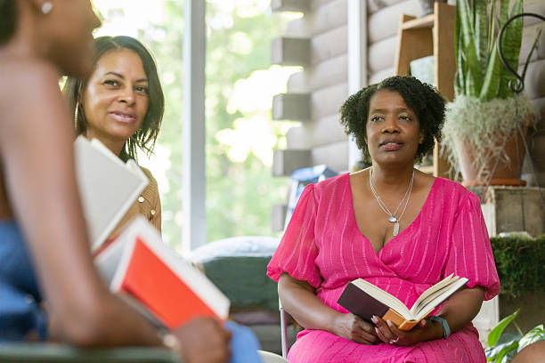 istock Sunroom book club meeting filled with joy 2220603346