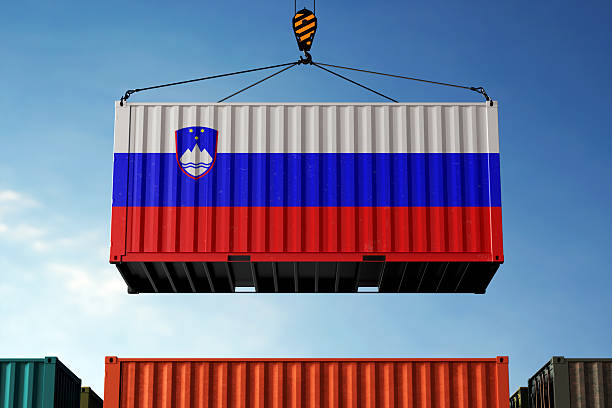 istock Slovenia trade cargo container hanging against clouds background 2220604540
