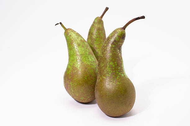 istock Pears standing in order in front of each other 2220605384
