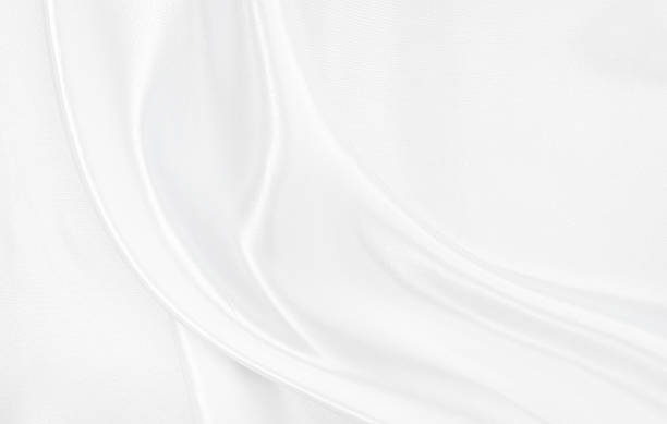 istock White gray satin texture that is white silver fabric silk background with beautiful soft blur pattern natural. 2220605666