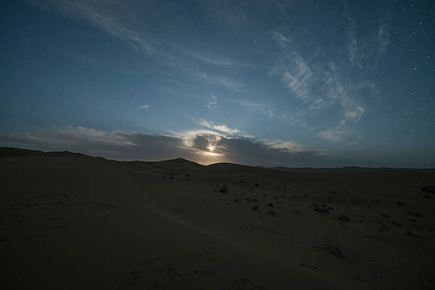 istock Beautiful moonlight on the desert at night 2220608531