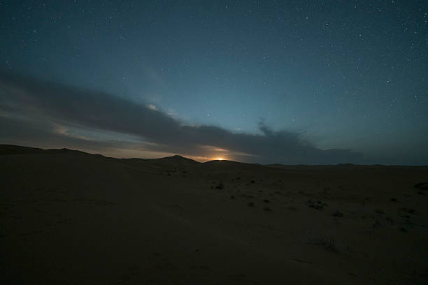 istock Beautiful moonlight on the desert at night 2220608546