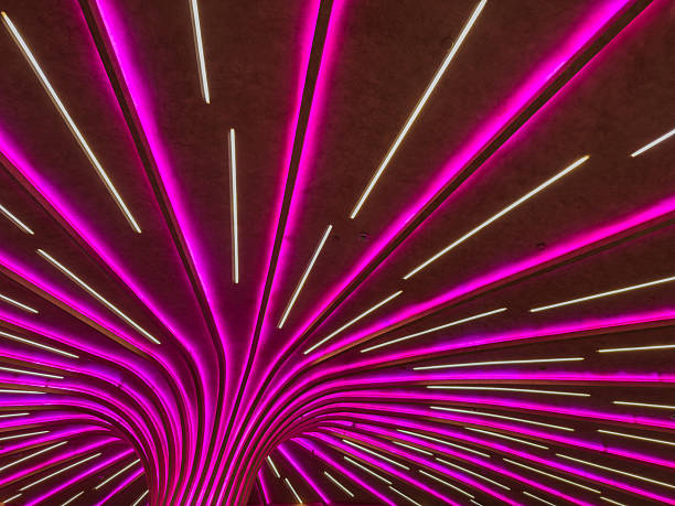 istock Modern ceiling installation with LED light strips. Futuristic interior lighting, Contemporary public space 2220611718