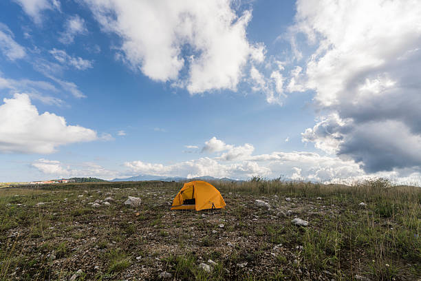 Camping on beautiful outdoor open fields and grasslands