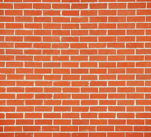 istock facade view of old red brick wall background 2220617565