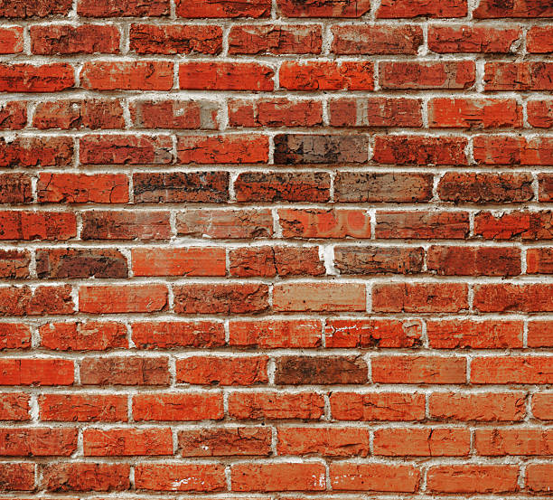 istock facade view of old red brick wall background 2220617659