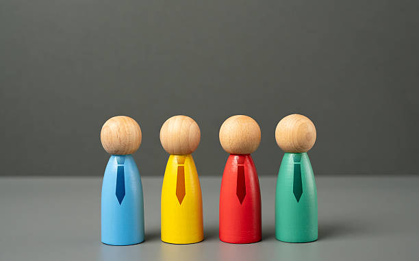 istock Figures of people with ties. Workers and employees. Different departments. Corporate structure, teamwork, office hierarchy. Professional roles in a business environment. 2220620054