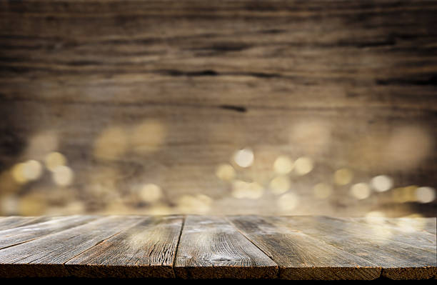 istock Empty rustic wooden table background. Old wood table with dark blurred background. Mock up. 2220627904