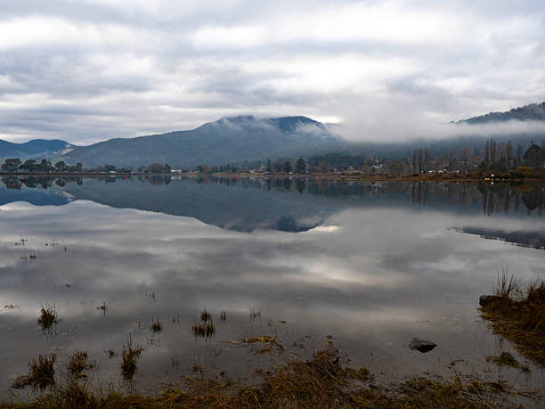Mount Beauty pondage with Mount Bogong covered in cloud behind it.