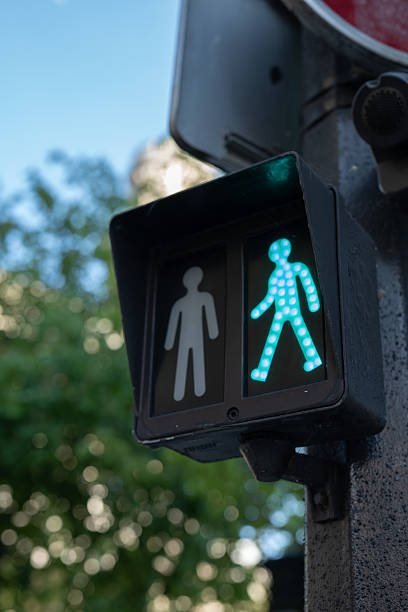istock green pedestrian crossing sign 2220628460