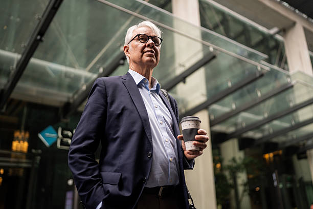 istock Businessman on Coffee Break in Sydney’s Urban Core 2220629258
