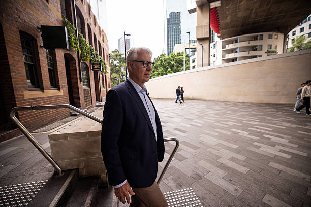 istock Confident Senior Man on Way to Office 2220630537