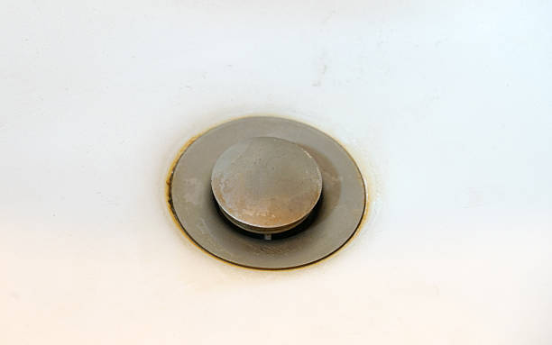 istock close up on dirty water sink in bathroom 2220634700