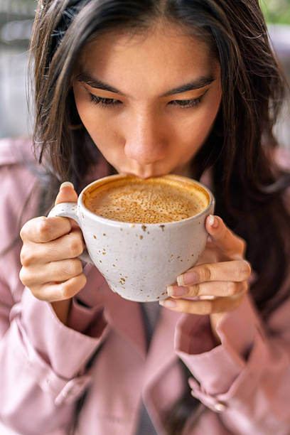 istock Young freelancer enjoying a cappuccino during work break at coffee shop 2220636707