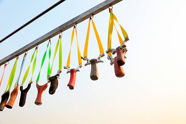 istock toy slingshot hung on the beam 2220638077