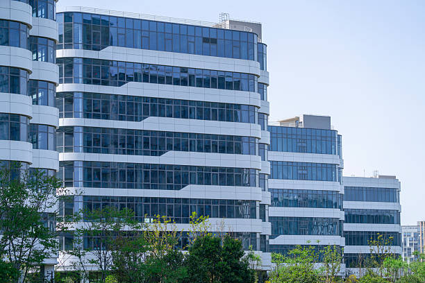 istock modern office building exterior in downtown district in Shanghai 2220642885