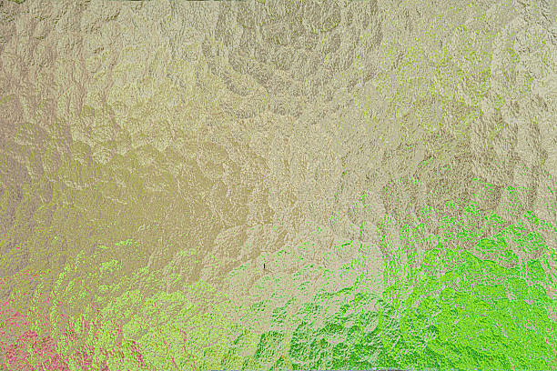 istock Abstract image of hammered glass backlit with different colors 2220644346