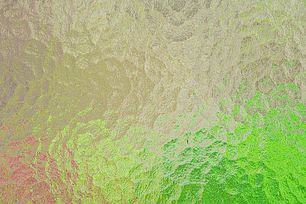 Abstract image of hammered glass backlit with different colors
