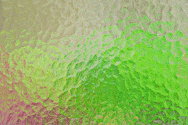 istock Abstract image of hammered glass backlit with different colors 2220644387