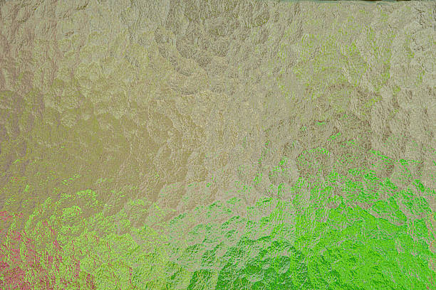 istock Abstract image of hammered glass backlit with different colors 2220644400
