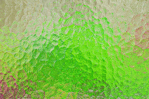 istock Abstract image of hammered glass backlit with different colors 2220644403