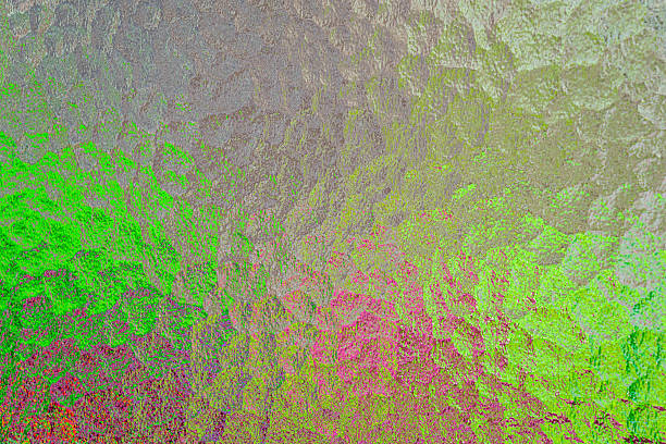 istock Abstract image of hammered glass backlit with different colors 2220644413