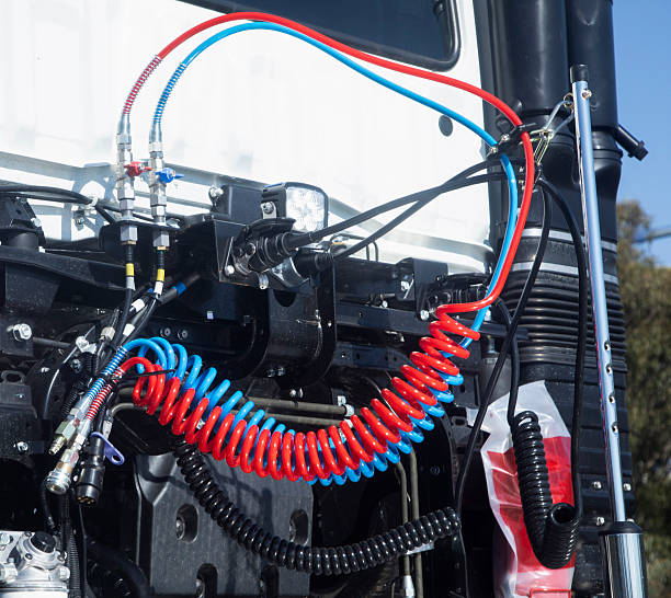istock Red and blue engineering pipes with truck technology. 2220644661