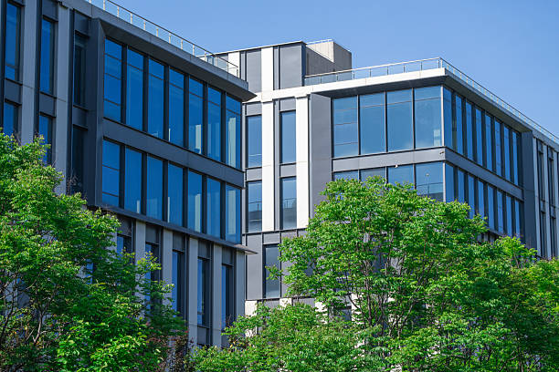 istock modern office building exterior in industrial area 2220646275