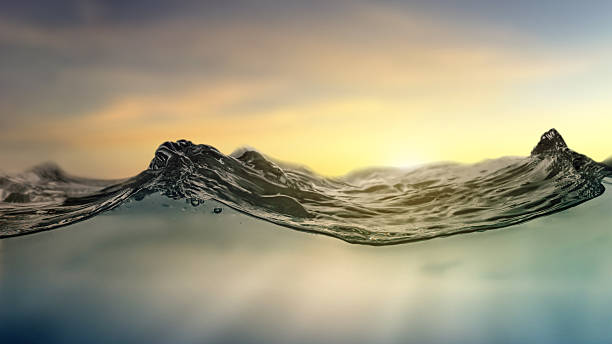 Clear water surface texture with ripples, splashes, and bubbles with sunlight. Abstract summer background