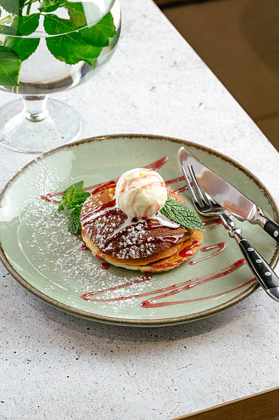pancakes with ice cream and berry sauce in Berlin, Berlin, Germany