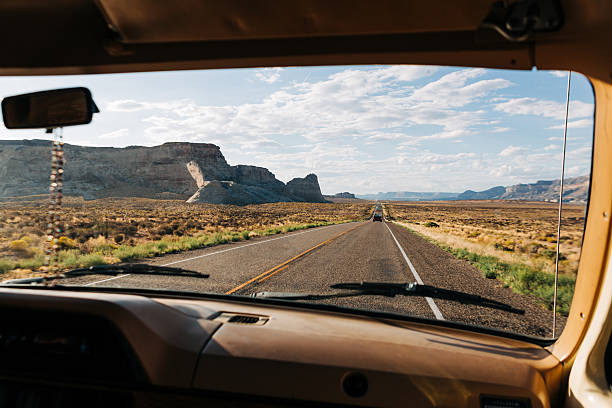 istock View from car driving Highway 89 through desert in Big Water, Utah. 2220649943