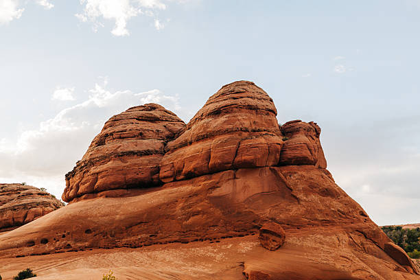 istock Rounded sandstone formation under a clear sky in Arches, Utah 2220650112
