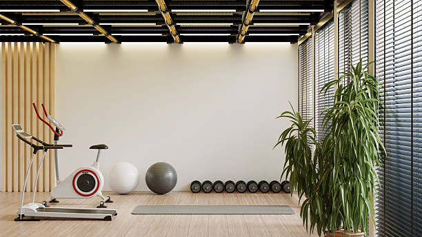 istock Modern home gym interior with exercise equipment and natural light- 3D rendering 2220652585