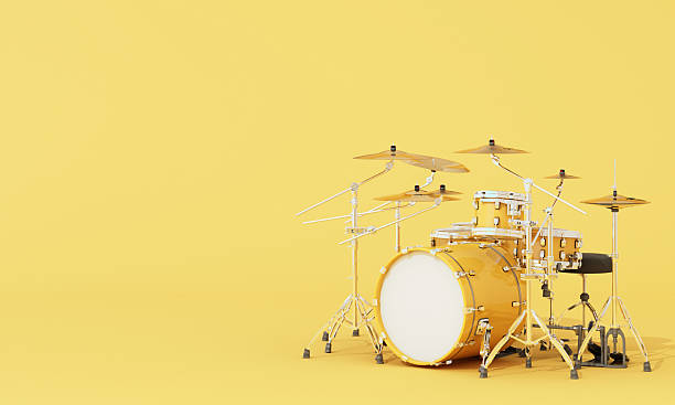 istock Minimalist yellow drum kit on solid yellow background, ideal for music concepts, jazz or rock band posters, and studio design visuals. 3d rendering. 2220653543