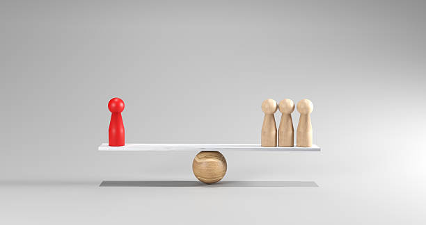 istock 3d Red doll and wooden doll figures balanced on a scale, symbolizing equality, leverage, strategic decision-making. Conceptual reflects fairness, power dynamics, resource management in modern business 2220654067