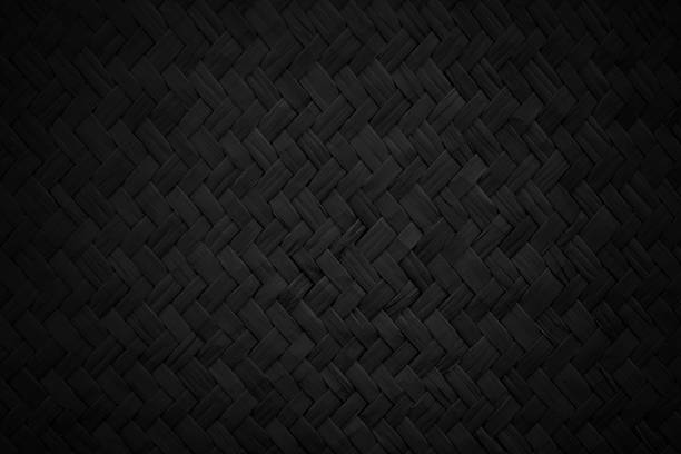 istock Pattern of black weave reed mat with vintage style for background and design art work. 2220654097